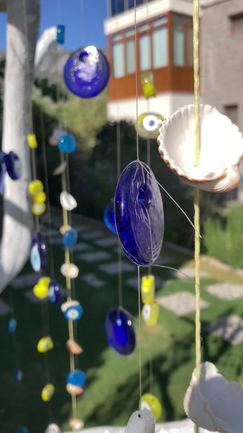 Turkish Evil Eye Bead Hanging on a Tree (Vertical) Stock Footage 277553134