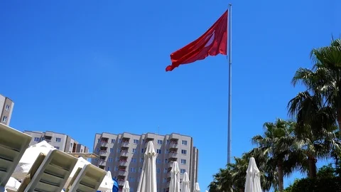 Turkish flag against the background of a multi-storey building. Stock Footage 92007606