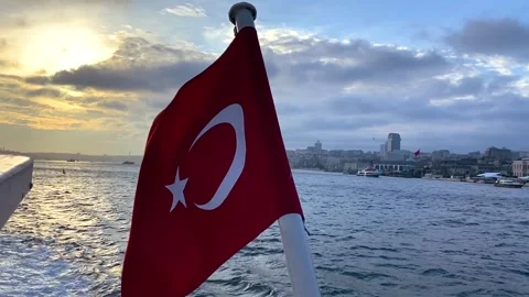 Turkish flag on the background of the Bosphorus. The fluttering of the Turkish Stock-Footage 203970767