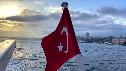 Turkish flag on the background of the Bosphorus. The fluttering of the Turkish Stock Footage 208936605