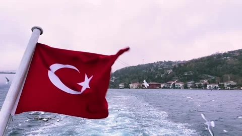 Turkish flag on the background of the Bosphorus. Turkey flag close-up. The Video stock 202114309