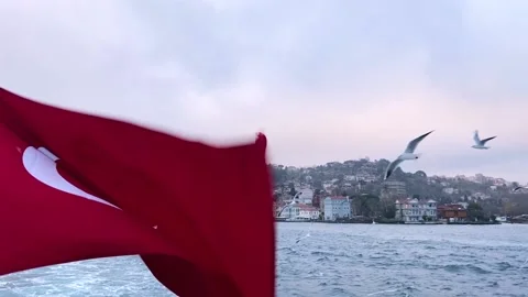 Turkish flag on the background of the Bosphorus. Turkey flag close-up. The Video stock 207413473