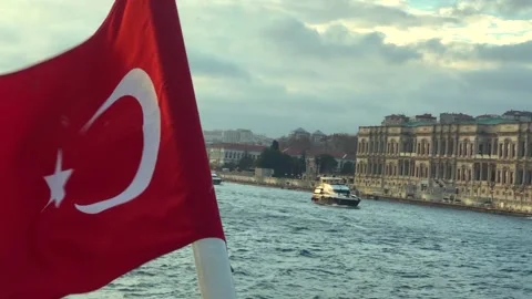 Turkish flag on the background of the Bosphorus. Turkey flag close-up. The Stock Footage 214497373