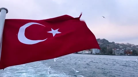 Turkish flag on the background of the Bosphorus. Turkey flag close-up. The Stock Footage 218302811