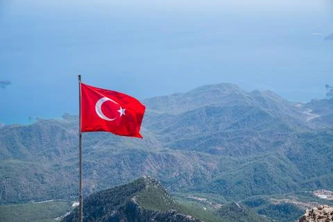 Turkish flag on the background of mountains 写真素材