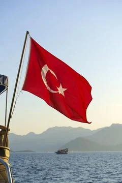 Turkish flag background. Red textile flag of Turkey on the streets of Istanbul Foto stock