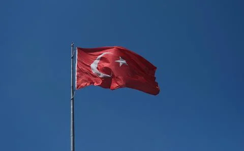 Turkish flag. Background sky. Stock Photos