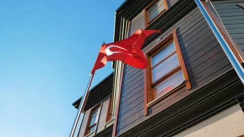 Turkish flag evolves against the background of the building Stock Footage 201605326