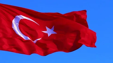 Turkish flag is floating in the blue sky Stock Footage 77171567