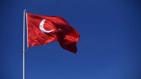Turkish flag flutters in the wind against the blue sky. Stock Footage 94804583