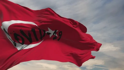 The Turkish flag flutters in the wind against the background of clouds floating Stock Footage 128756288
