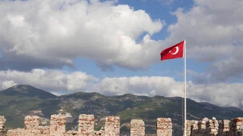 Turkish flag over old castle Stock Footage 83361100