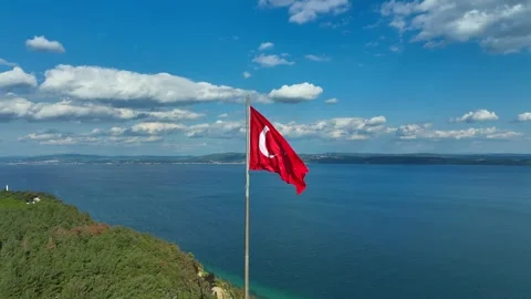 Turkish flag. Red Turkish flag waving on the sea Stock Footage 253820924