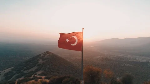 Turkish flag at the top of the mountain 스톡 동영상 128863394