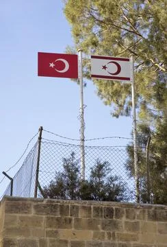 Turkish flag at united nations buffer zone in Cyprus - green line in Nicosia. Stock Photos