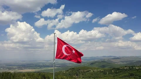 Turkish flag waving in the sky Stockbeeldmateriaal 287283647