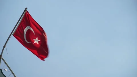 Turkish flag waving in the wind, mountains and sea in the background Stock-Footage 201267187