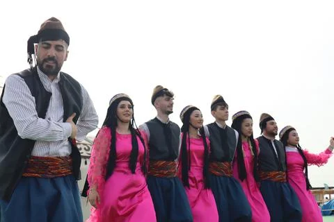 Turkish folk dance group performs dances from Diyarbakır region on stage Stock Photos