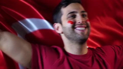 Turkish Guy Celebrating with Turkey Flag Stock Footage 77702548