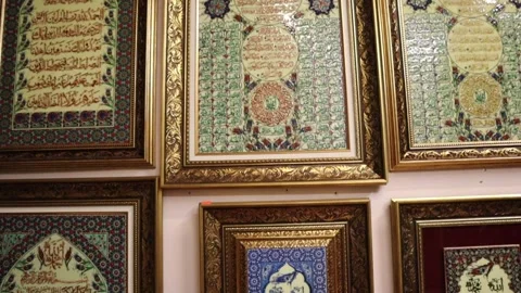 Turkish handmade Arabic calligraphy ceramic plates hanging on the wall Video stock 245331905