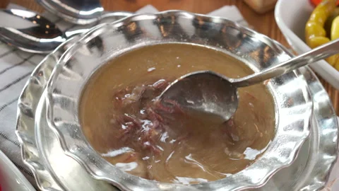 Turkish Kelle paca soup,Traditional Turkish food, Kelle Paça Çorbası Stock Footage 226415674