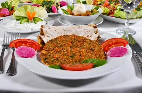 Turkish lahmacun kebap, one of the most important dishes of Turkish cuisine Stock Photos