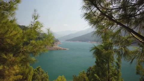 Turkish landscape pine forest and Reservoir Dim Cay Stock Footage 141754574