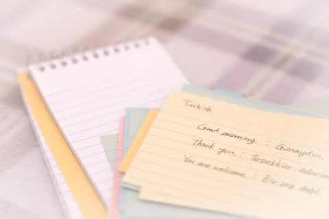 Turkish; Learning New Language Writing Greetings on the Notebook Stock Photos