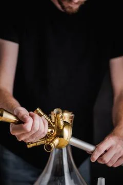 A turkish man show the methode of how to set up a hookah Stock Photos