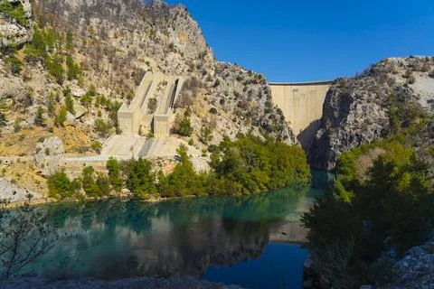Turkish Oympinar Dam. Human interference in natural environment. Concrete dam Stock Photos