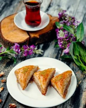 Turkish pakhlava with nuts in triangular shape Stock Photos