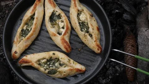 Turkish Pide in Frying Pan, Type of Flatbread Pizza, Outdoor Cooking, Close Up Stock Footage 191986705