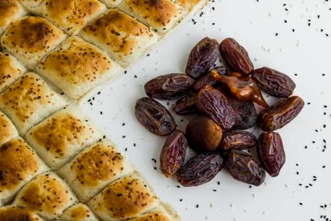 Turkish Ramadan Bread,pide and dates in the form of crescent and star Stock Photos
