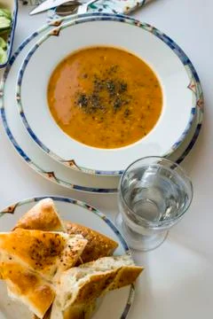 Turkish Ramadan Dinner Table with soup,bread and water. Stock Photos