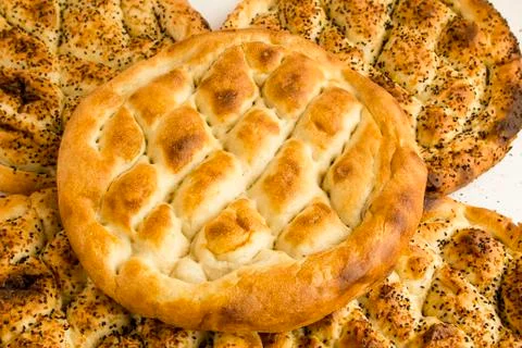 Turkish Ramadan flat bread,pide on the white surface Stock Photos