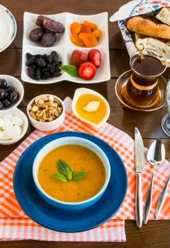 Turkish Ramadan-iftar dinner table with Turkish soup, Ezo Gelin Stock Photos