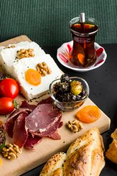 Turkish Ramadan,iftar start menu with dry aged meat,bacon,tea and bread Foto stock