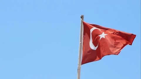 Turkish red flag waving with the wind in the blue sky with full glory Stock Footage 202342661