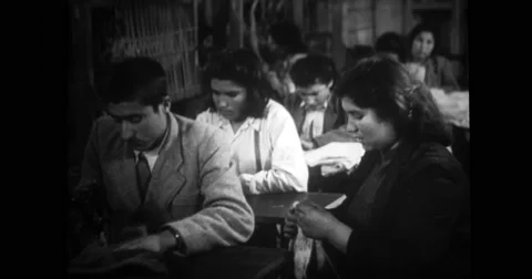 Turkish students learning sewing in classroom Stock Footage