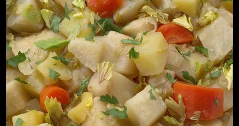 Turkish-style braised celeriac. Abstract food texture. Stock Footage 279577894