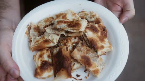 Turkish style meat stuffed pie, dough borek served on street food festival Stock Footage 219057592