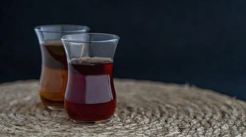Turkish tea on circular straw base. Stock Photos