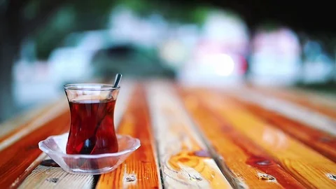 Turkish tea on the wooden table  Stock Footage 84036193