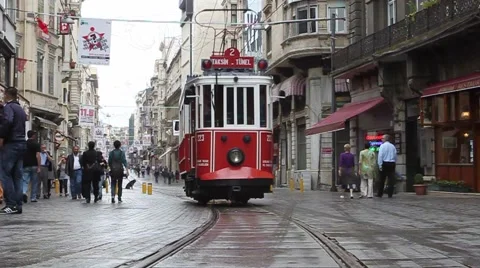 Turkish tram drives away down the Istiklal shopping district 動画素材 56433031