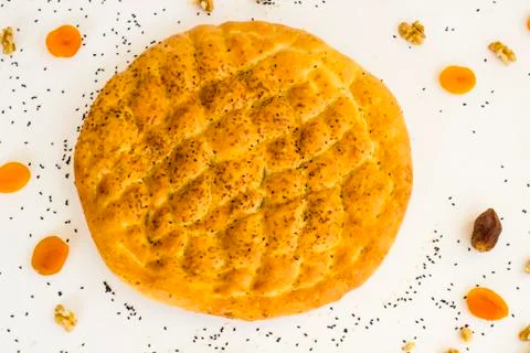 Turkish,Fresh,Circular Ramadan Bread on white surface Foto stock
