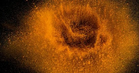 Turmeric, curcuma longa, Powder Exploding against Black Background, Indian .. 写真素材