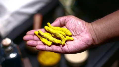 Turmeric on Hand Video stock 125240563