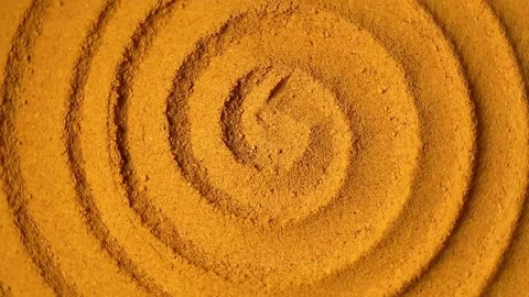 Turmeric powder spirally twisted, close-up image Stock Footage 134208280