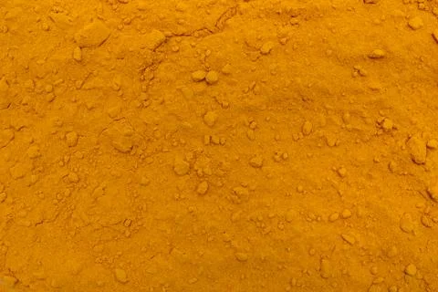 Turmeric powder texture Stock Photos
