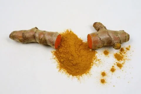 Turmeric root and turmeric powder separate on a white background Stock Photos